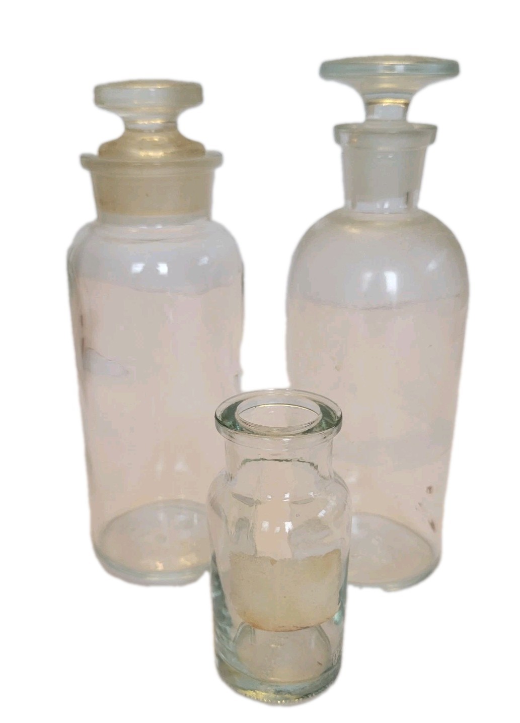 Three Vintage Apothecary Bottles Two Glass Stoppers One TCW Co. Varies Sizes Three Vintage Apothecary Bottles Two Glass Stoppers One TCW Co. Varies Sizes