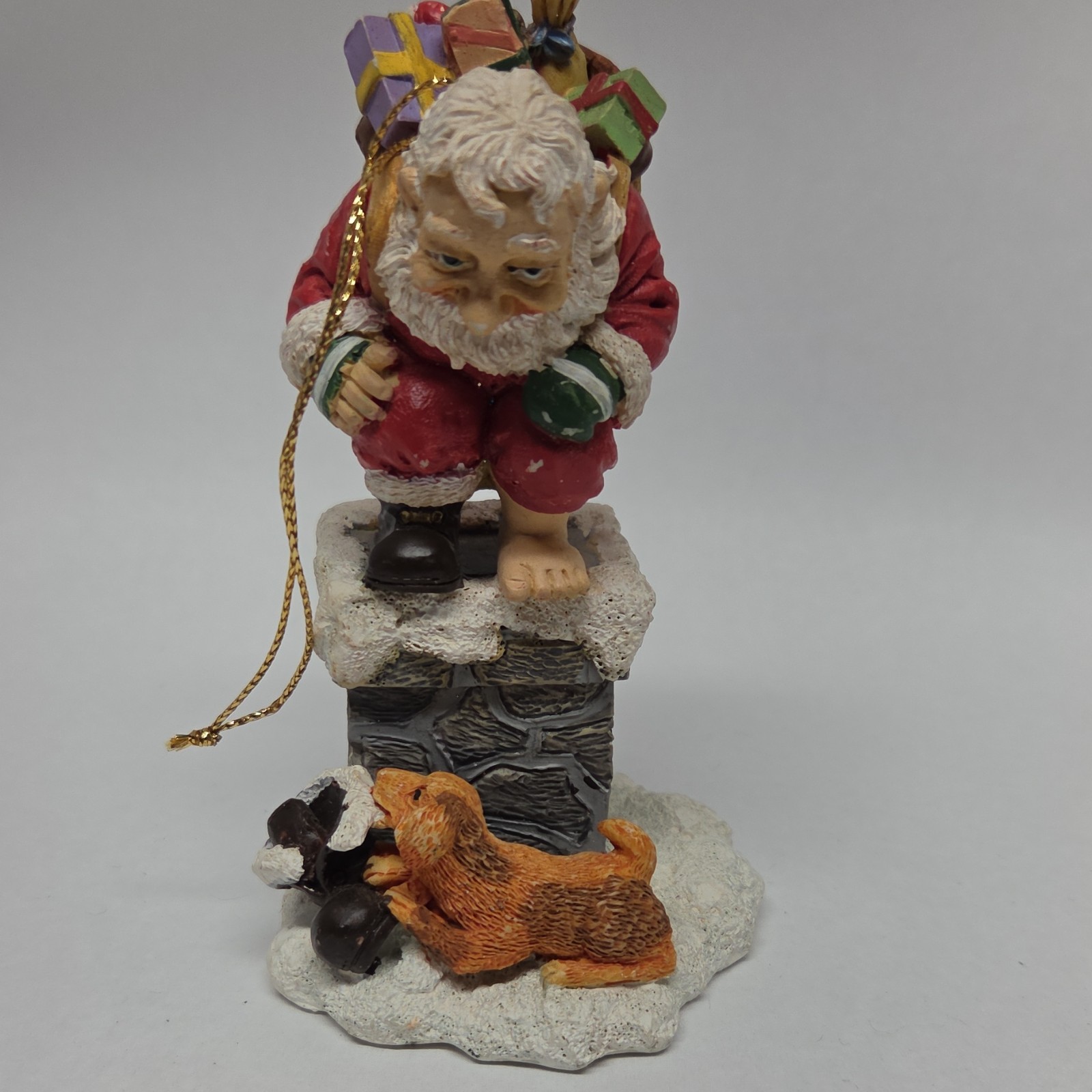 rare Santa Claus with Bag on Chimney with dog chewing his missing boot ornament
