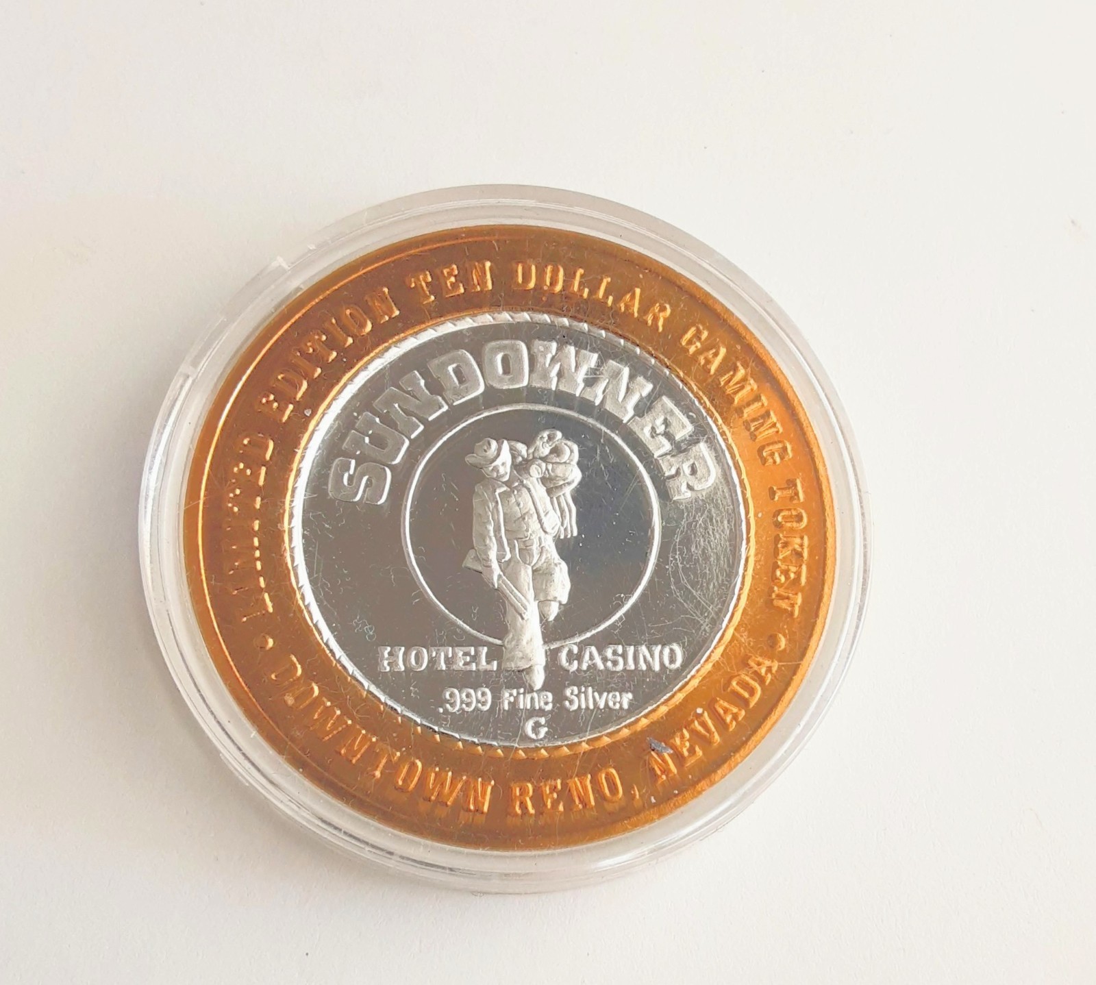 SunDowner Hotel & Casino Reno NV $10 .999 Silver .60 & Brass Gaming Token
