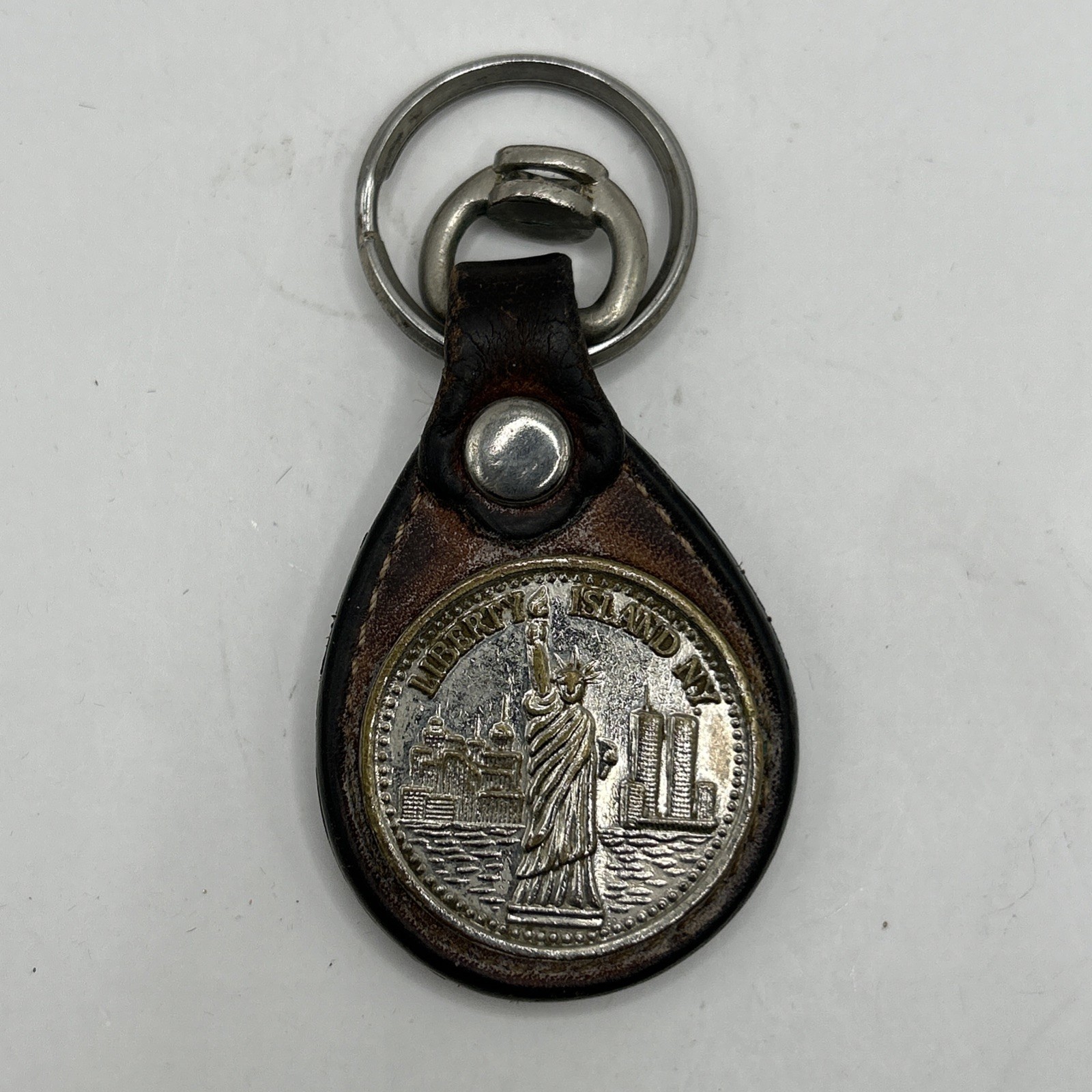 VTG 1987 NYC Keychain RARE Leather & Metal Medallion; Liberty/Twin Towers VTG 1987 NYC Keychain RARE Leather & Metal Medallion; Liberty/Twin Towers