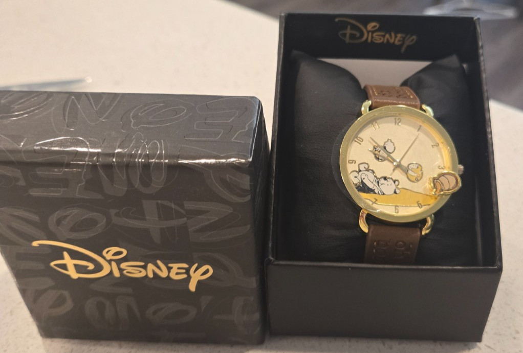 Rare Disney's Winnie the Pooh Watch Gold Bezel a spilled honeypot