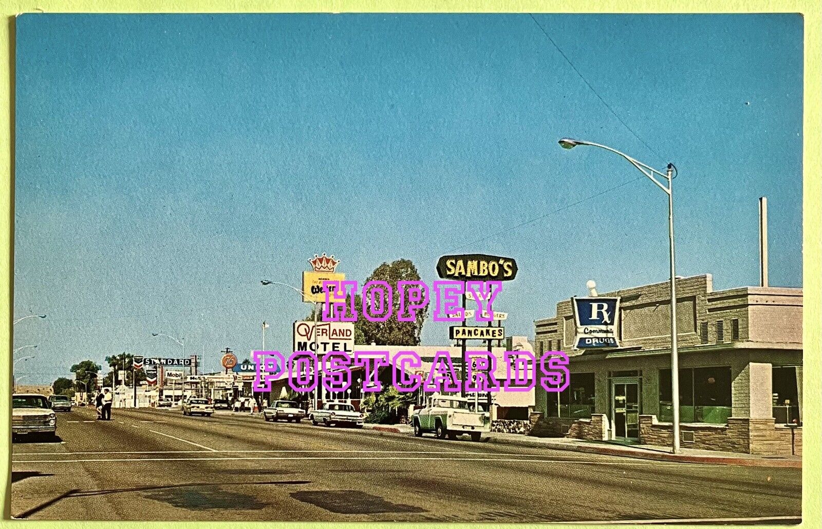 ROUTE 66~ NEEDLES, CA~ MAIN ST~SAMBO'S ~ 76, MOBIL, STANDARD GAS~postcard~1960s