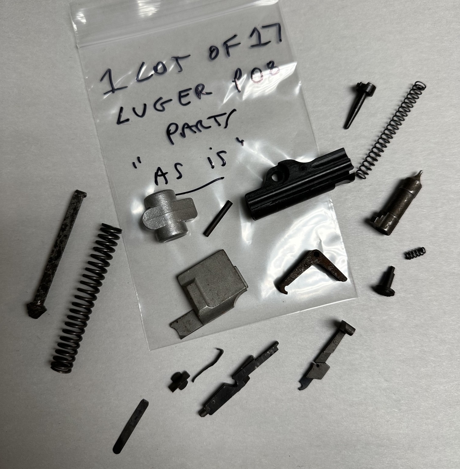 LOF OF 17 LUGER WWII P08  SPARE PARTS.