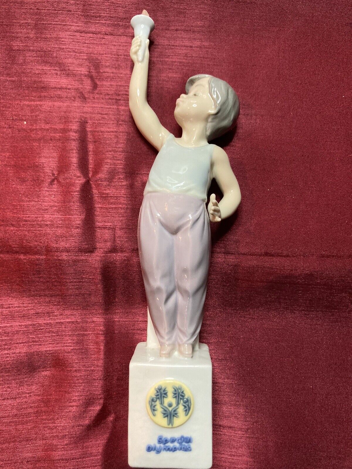 LLADRO #7513 SPECIAL OLYMPICS BOY HOLDING TORCH - 1991
