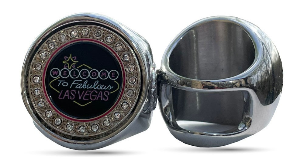 The Welcome to Las Vegas deCAPitator ring bottle cap and can tab opener