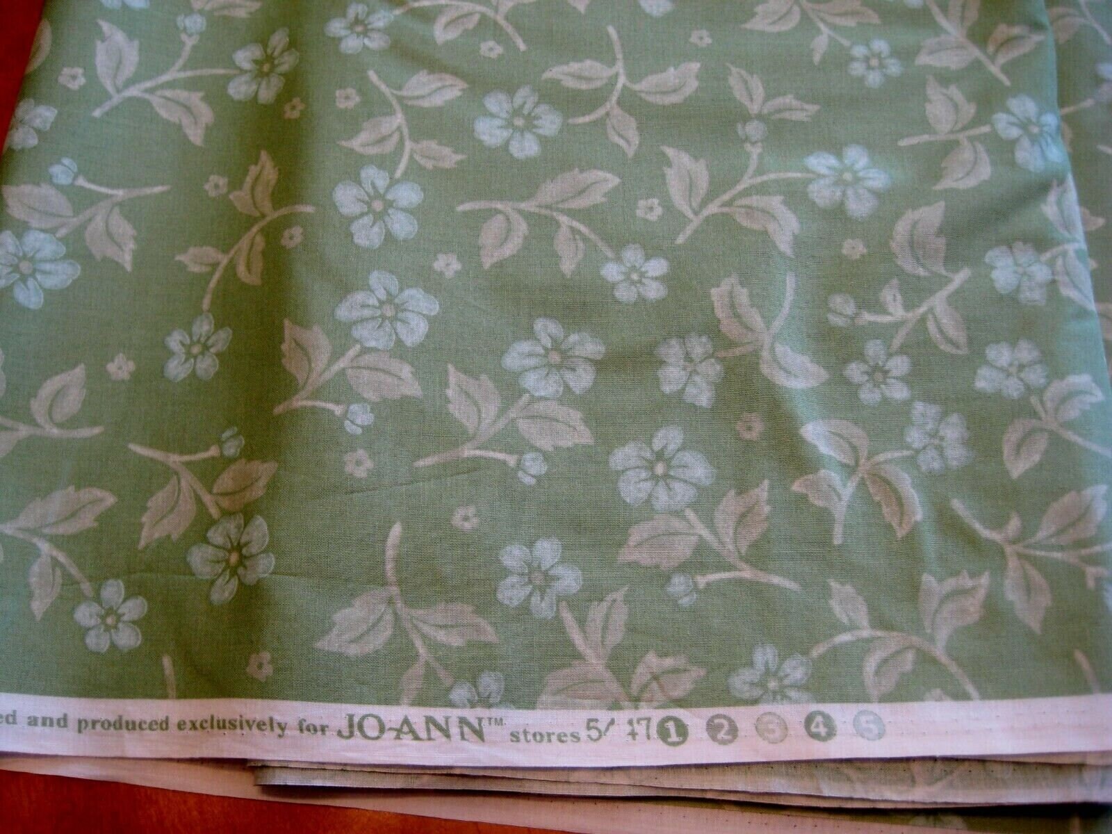 4 uncut yards  Jo-Ann Blue flowers on pastel green background quilter fabric OOP