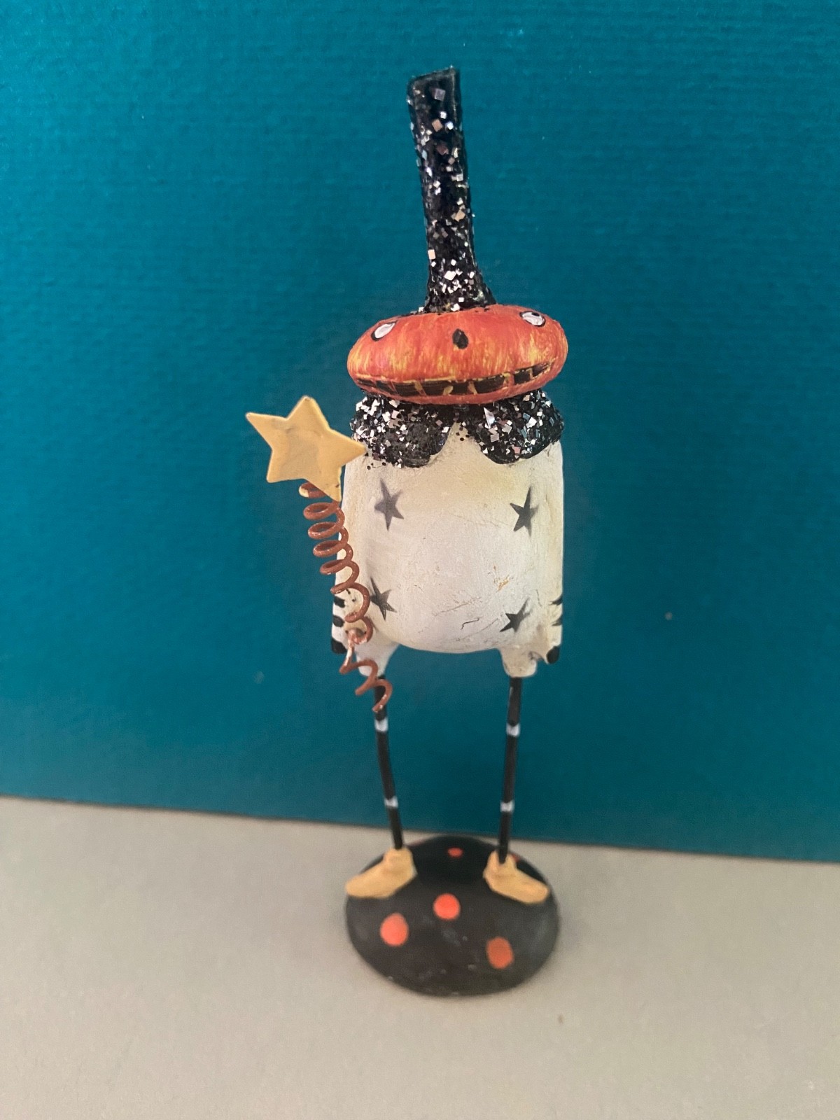 The K & K  Interiors Resin Standing Pumpkin Man w/ Hat and Holding a Star (OS)