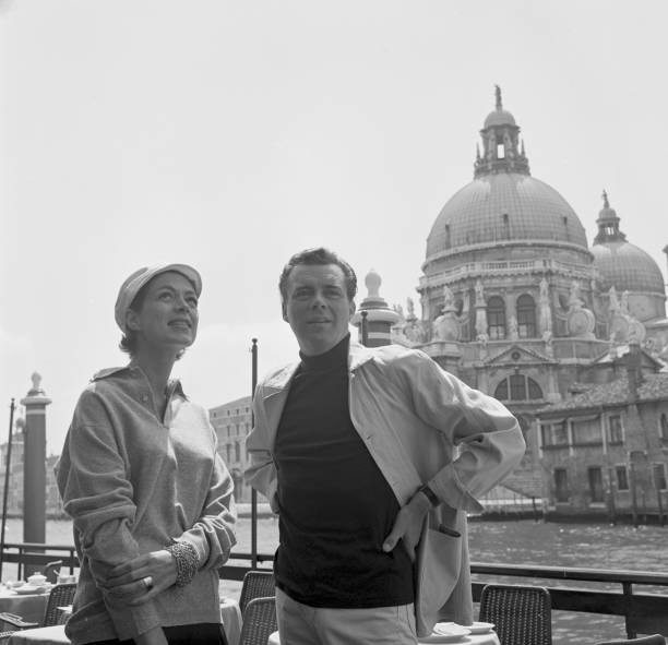 English actor Dirk Bogarde posing photographer Jill Melford along - Old Photo English actor Dirk Bogarde posing photographer Jill Melford along - Old Photo