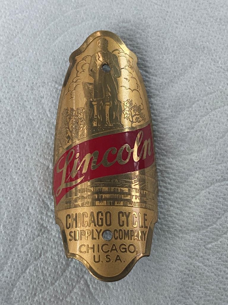 NOS vintage bicycle Schwinn LINCOLN head BADGE