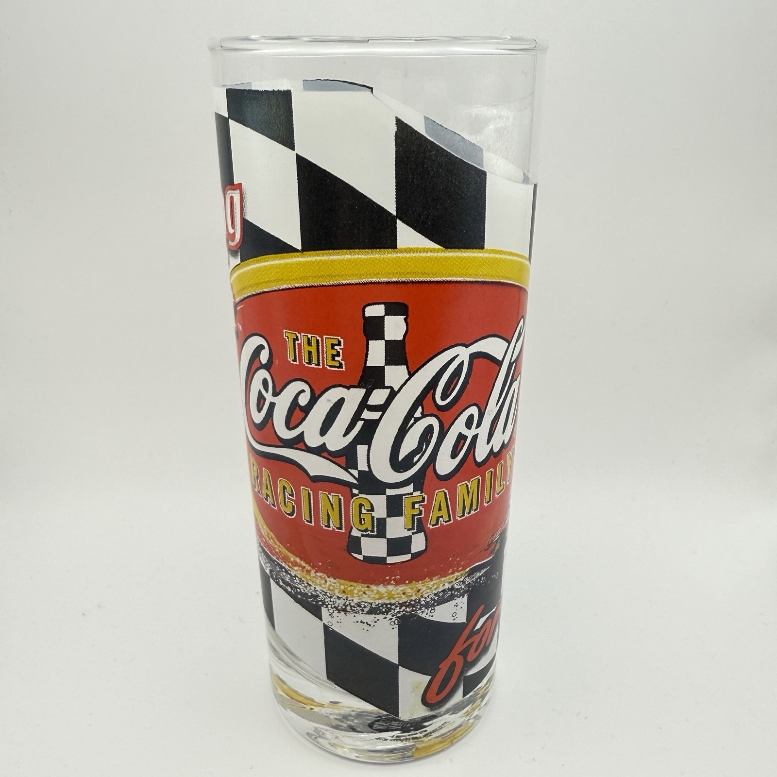 Vintage 1999 Coca-Cola Glass 12oz - The Racing Family, “Driving Your Thirst” Vintage 1999 Coca-Cola Glass 12oz - The Racing Family, “Driving Your Thirst”