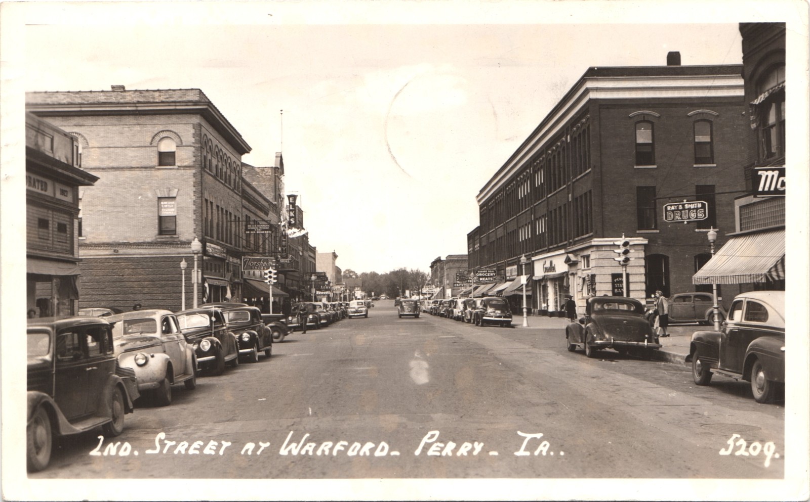2ND STREET & WARFORD perry ia 1940s postcard iowa real photo rppc downtown