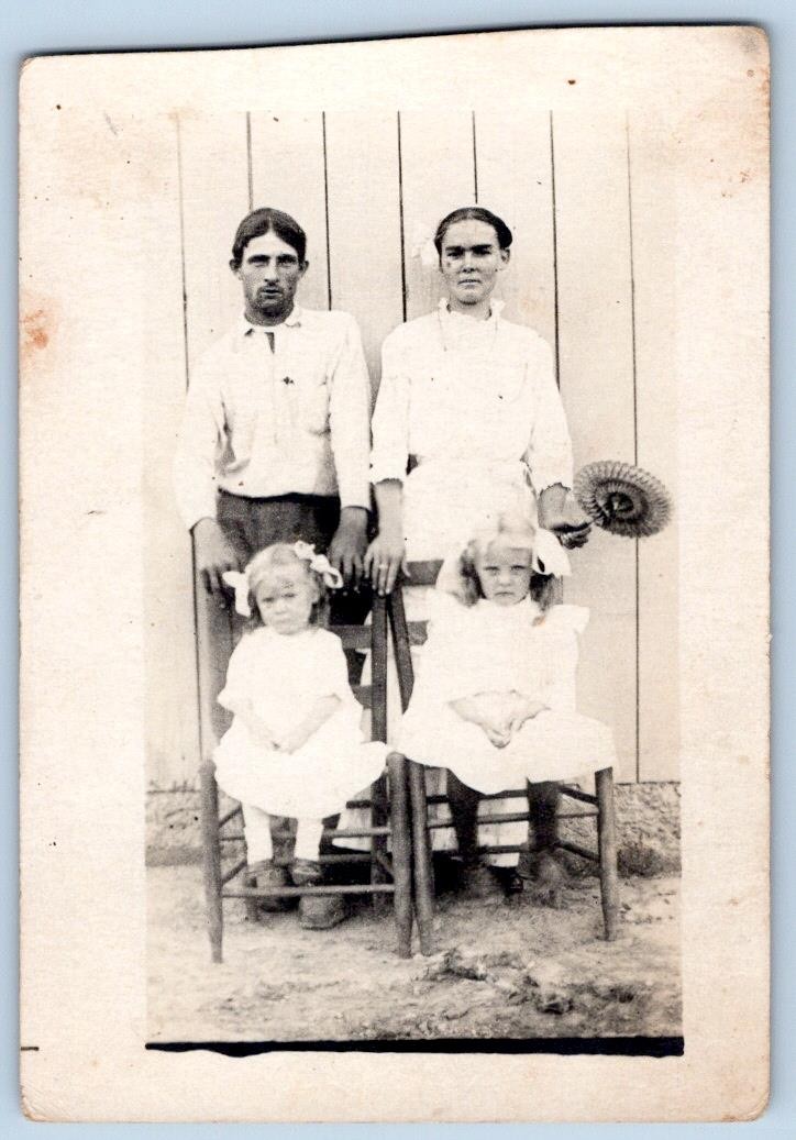 1910-20's RPPC POUTING LITTLE GIRLS FAMILY HONEYCOMB FAN PHOTO POSTCARD*TRIMMED