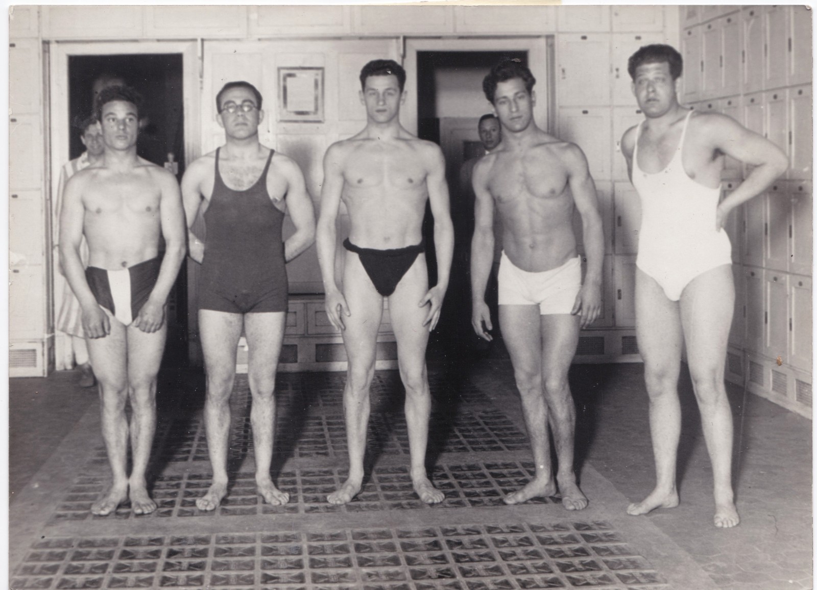 Vintage photo - Five handsome guys model swimsuits in locker room - Gay interest