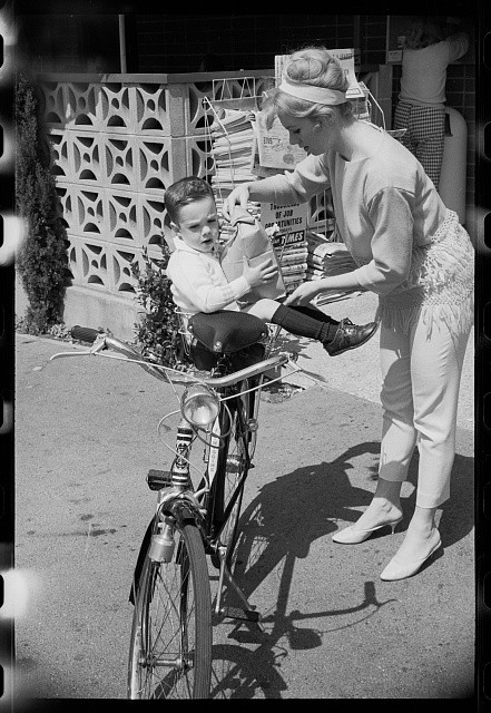 Photo:Shirley Jones 1960s Woman Helping Boy on Bicycle Noir Print