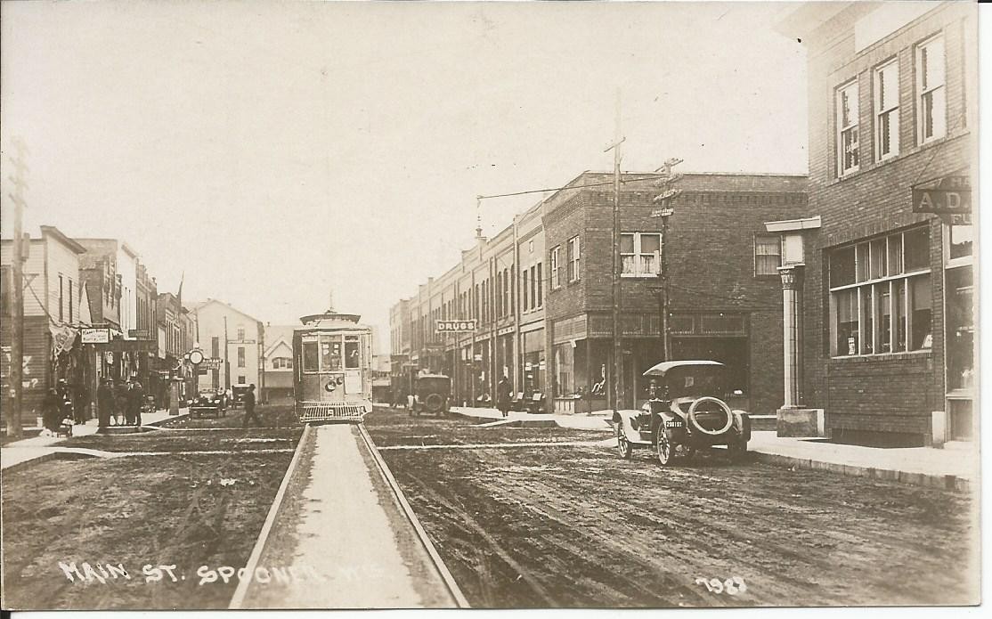 Vintage 1920s Era RPPC Main Street Scene Spooner WI Wisconsin Postcard Trolley