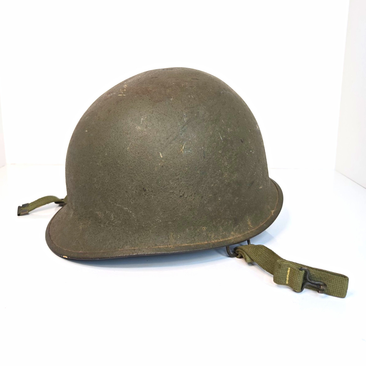 WWII US M1 Steel Helmet Shell w/ Green Chinstrap Stamped WWII US M1 Steel Helmet Shell w/ Green Chinstrap Stamped