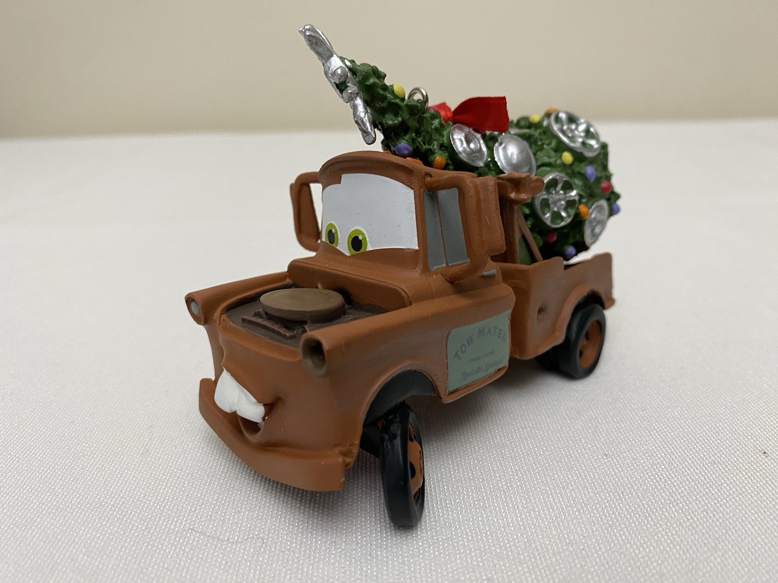 Disney Parks Pixar Tom Mater With Christmas Tree Ornament NWT Disney Parks Pixar Tom Mater With Christmas Tree Ornament NWT