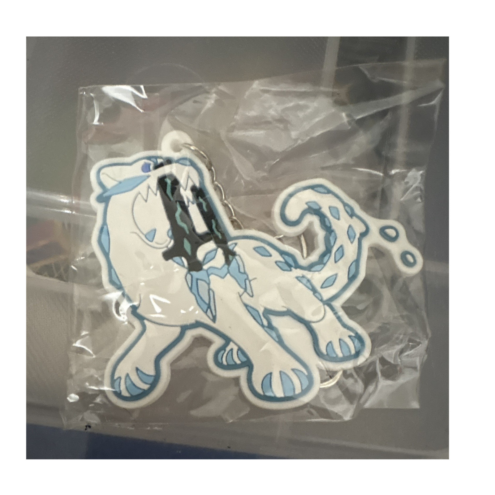 Pokémon Alolan Vulpix Acrylic & Metal Clip-On Keychain, White/Blue 2024 A24
