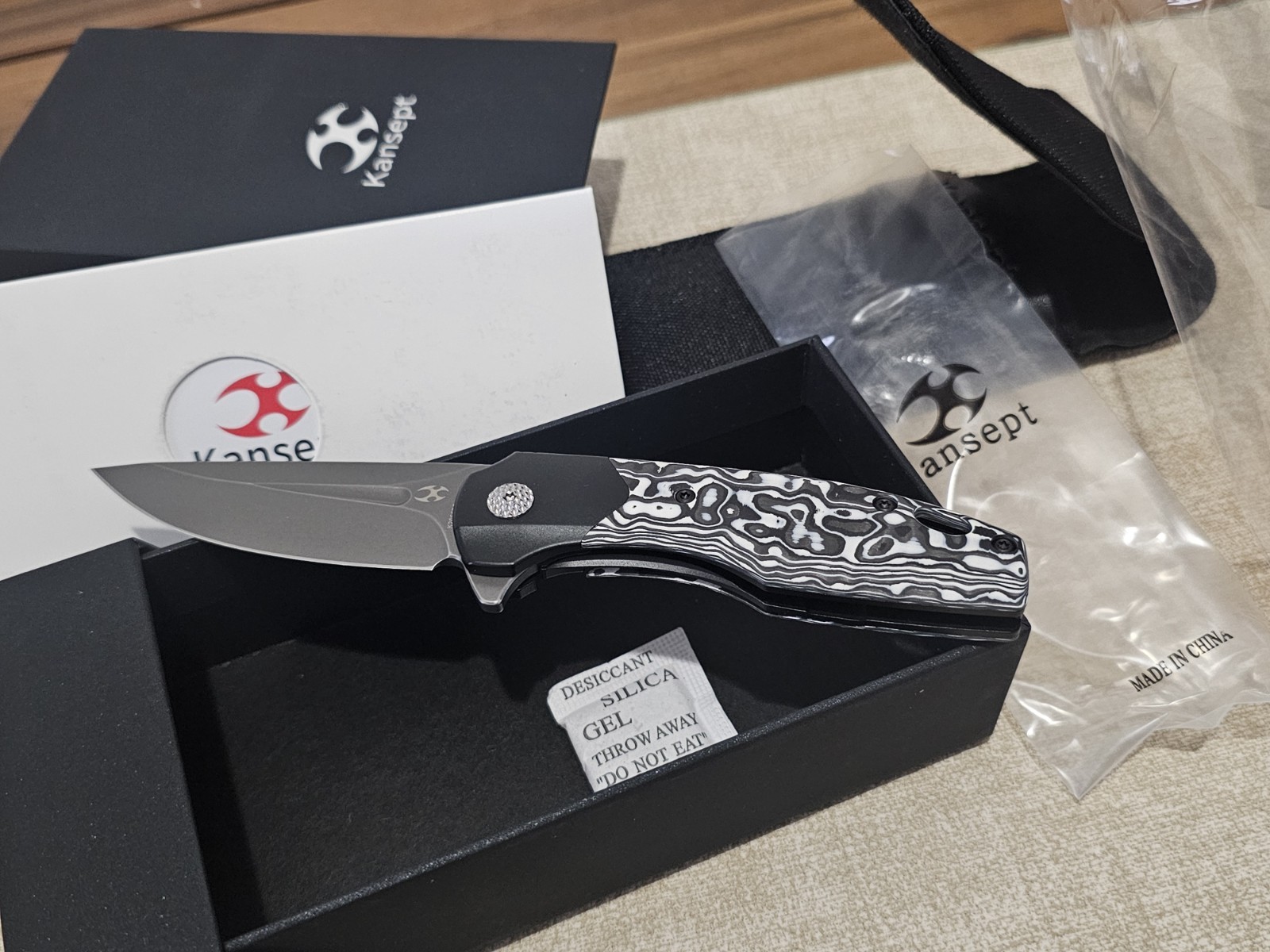 Kansept Cassowary CPM-S35 VN  Steel, Titanium + Blk/Blue Carbon Fiber Scales
