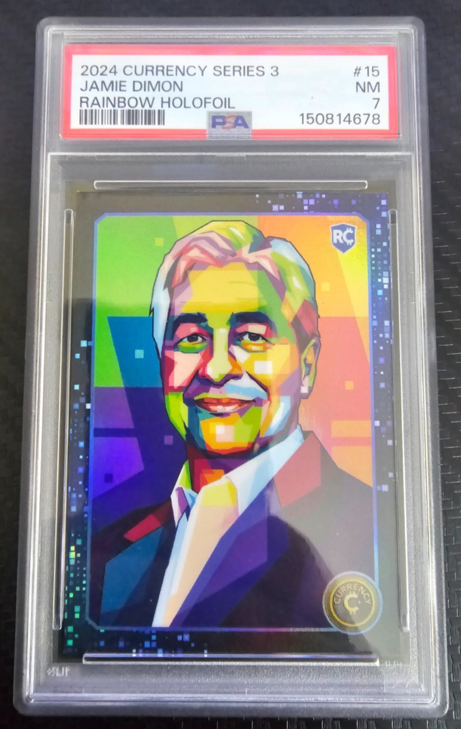 2024 Currency Series 3 Jamie Dimon Rainbow Holofoil Rookie Card PSA 7