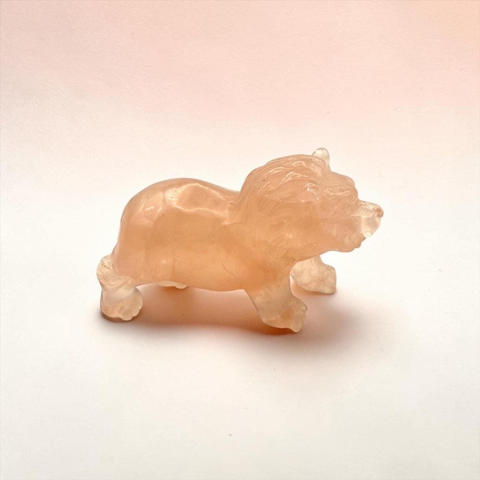 Deep Pink Rose Quartz Lion Carving, 5-Inch Natural Stone Sculpture Deep Pink Rose Quartz Lion Carving, 5-Inch Natural Stone Sculpture