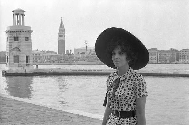 Gina Lollobrigida Wearing A Wide Brimmed Hat And A Fancy Dre - 1967 Venice photo