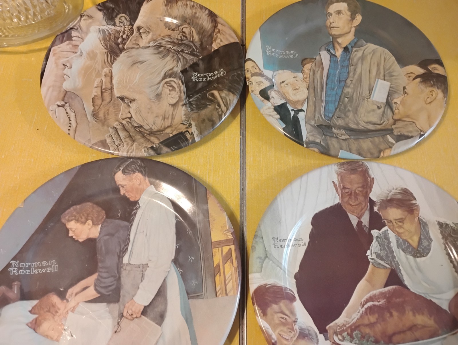set of 4 Norman Rockwell metal hanging plates 