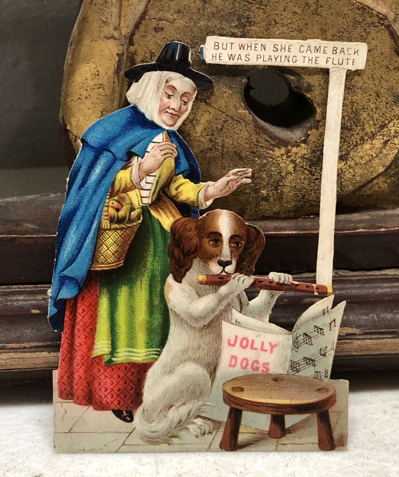 Victorian Die Cut Embossed Grandma w/ Dog playing Flute \