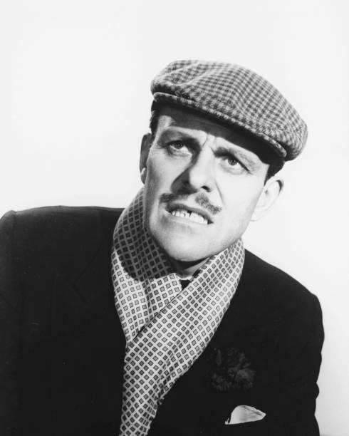 English comic actor Terry Thomas wearing a tweed cap a scarf 1960 Old Photo