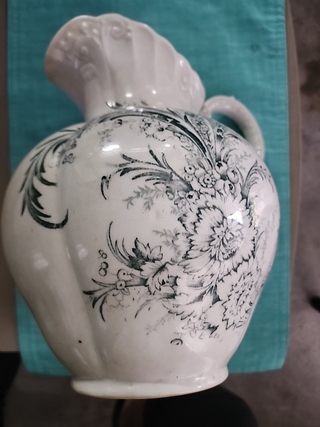 AI Overview+1This item is a vintage ceramic pitcher, likely produced by...