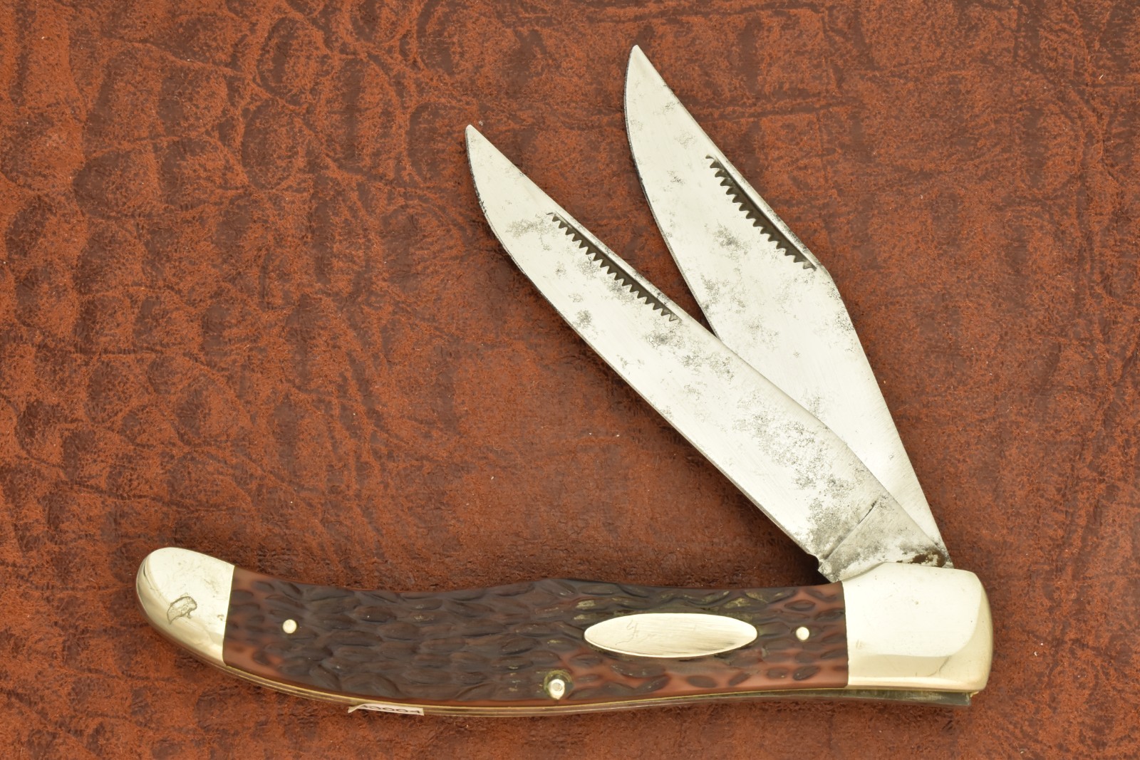 VINTAGE 1950-1961 WESTERN USA JIGGED BROWN DELRIN FOLDING HUNTER KNIFE (33664)