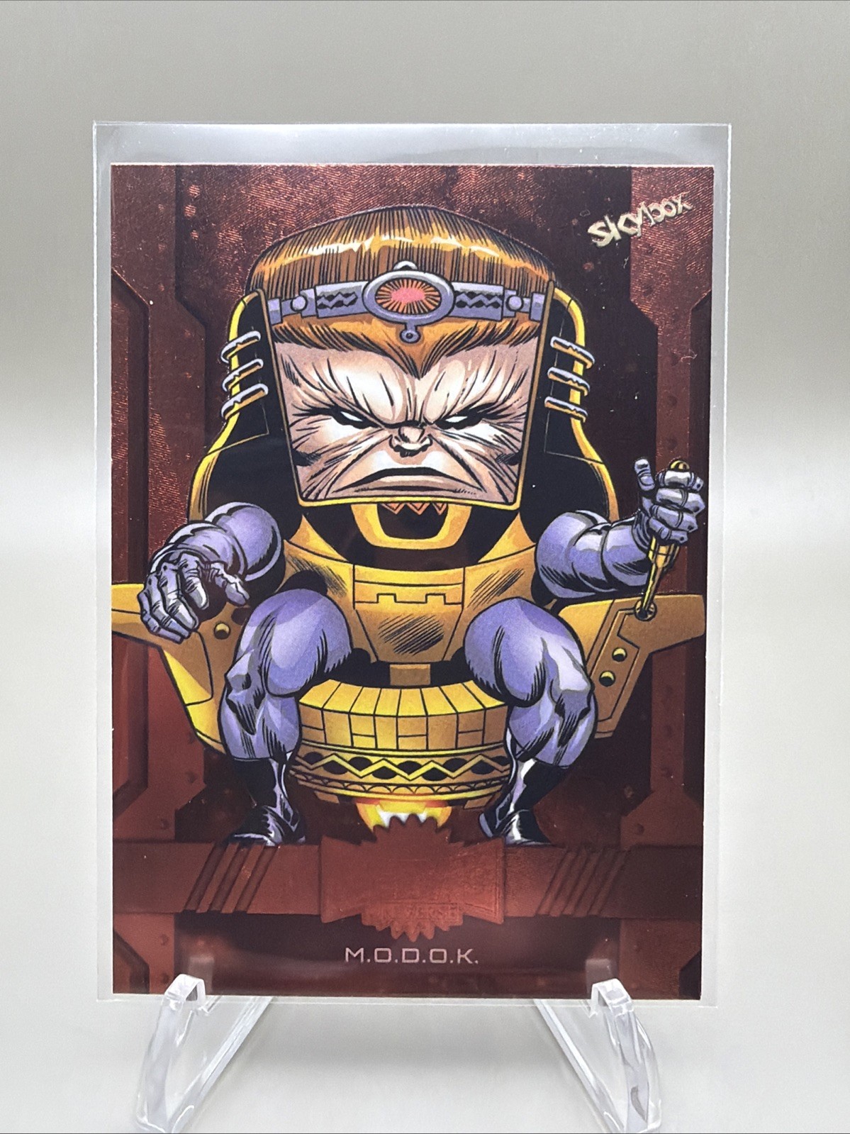 2024 SkyBox Metal Universe Marvel Avengers #70 M.O.D.O.K. Copper FX