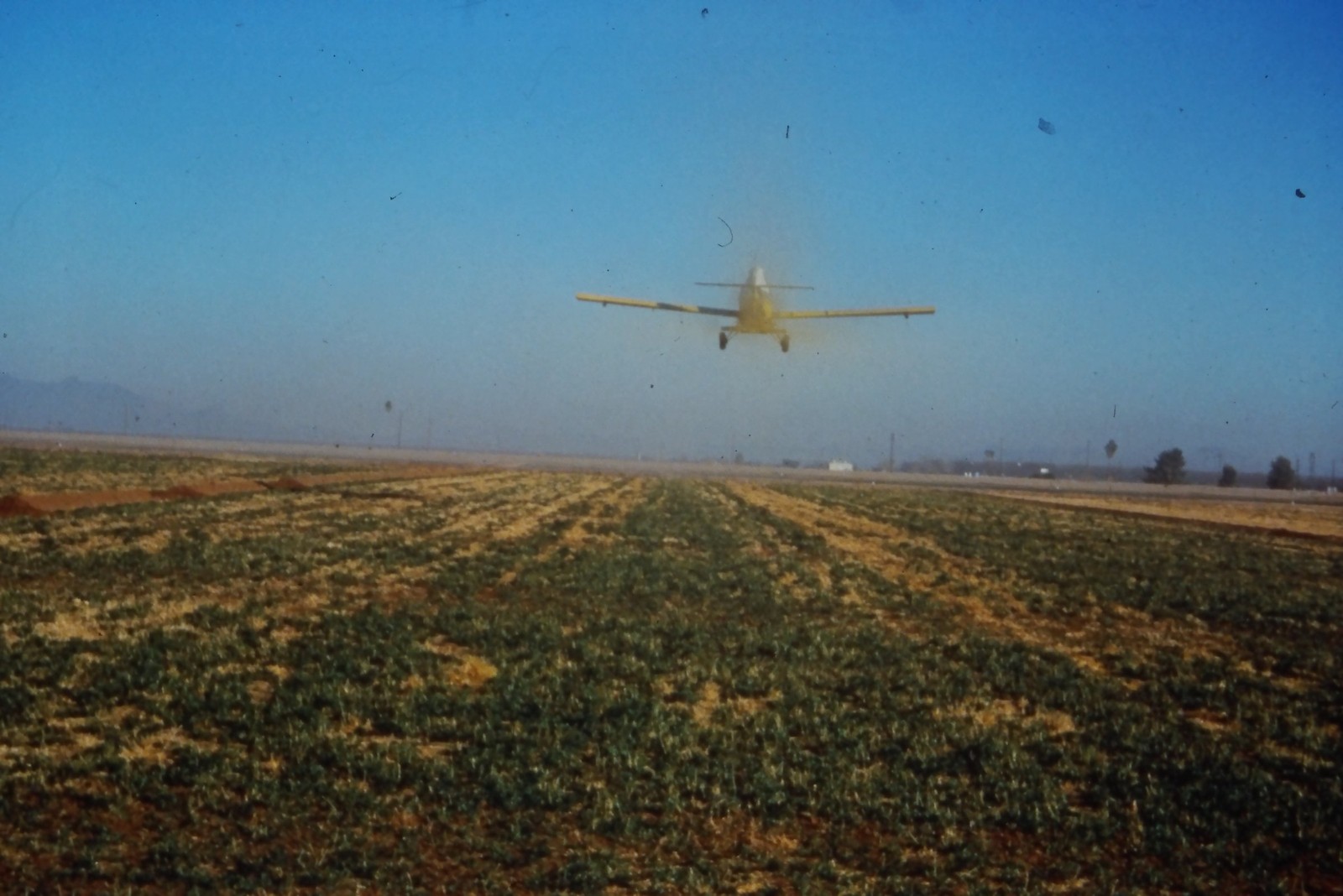 c1960\'s 35mm Slide Crop Duster Airplane Agricultural Field Building Road Rural c1960\'s 35mm Slide Crop Duster Airplane Agricultural Field Building Road Rural