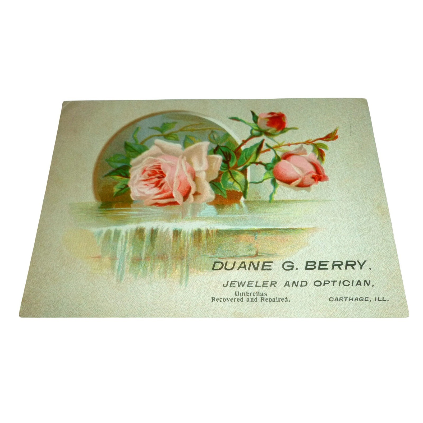 Antique Duane G Berry Jeweler Optician Carthage IL Trade Card Pink Roses Floral
