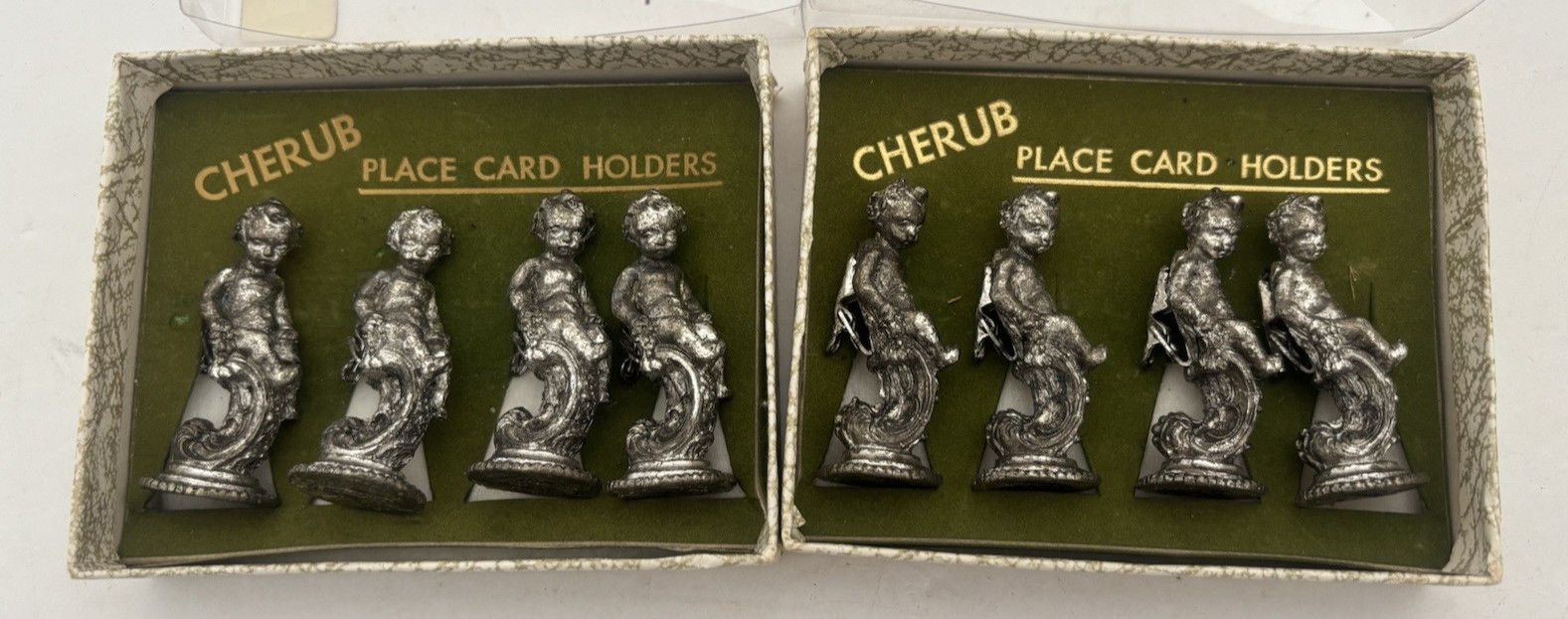 Vintage Lot of 8 Silver Toned Cast Metal Cherub Figural Place Card Holders Vintage Lot of 8 Silver Toned Cast Metal Cherub Figural Place Card Holders