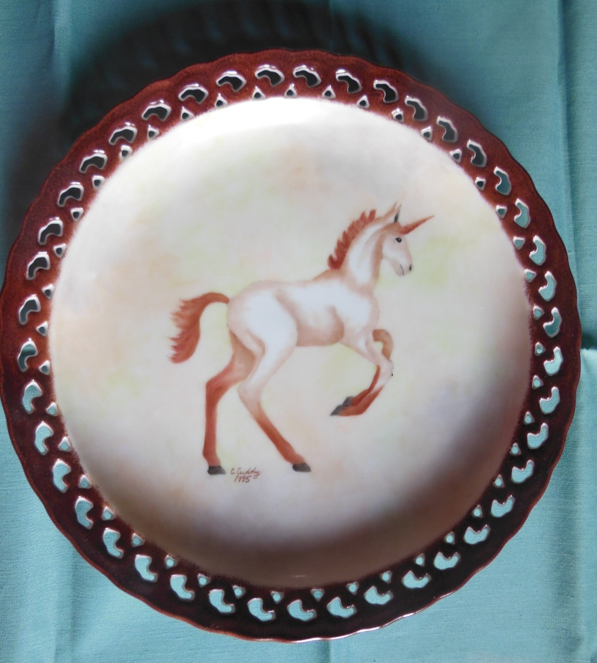 hand painted porcelain plate of unicorn