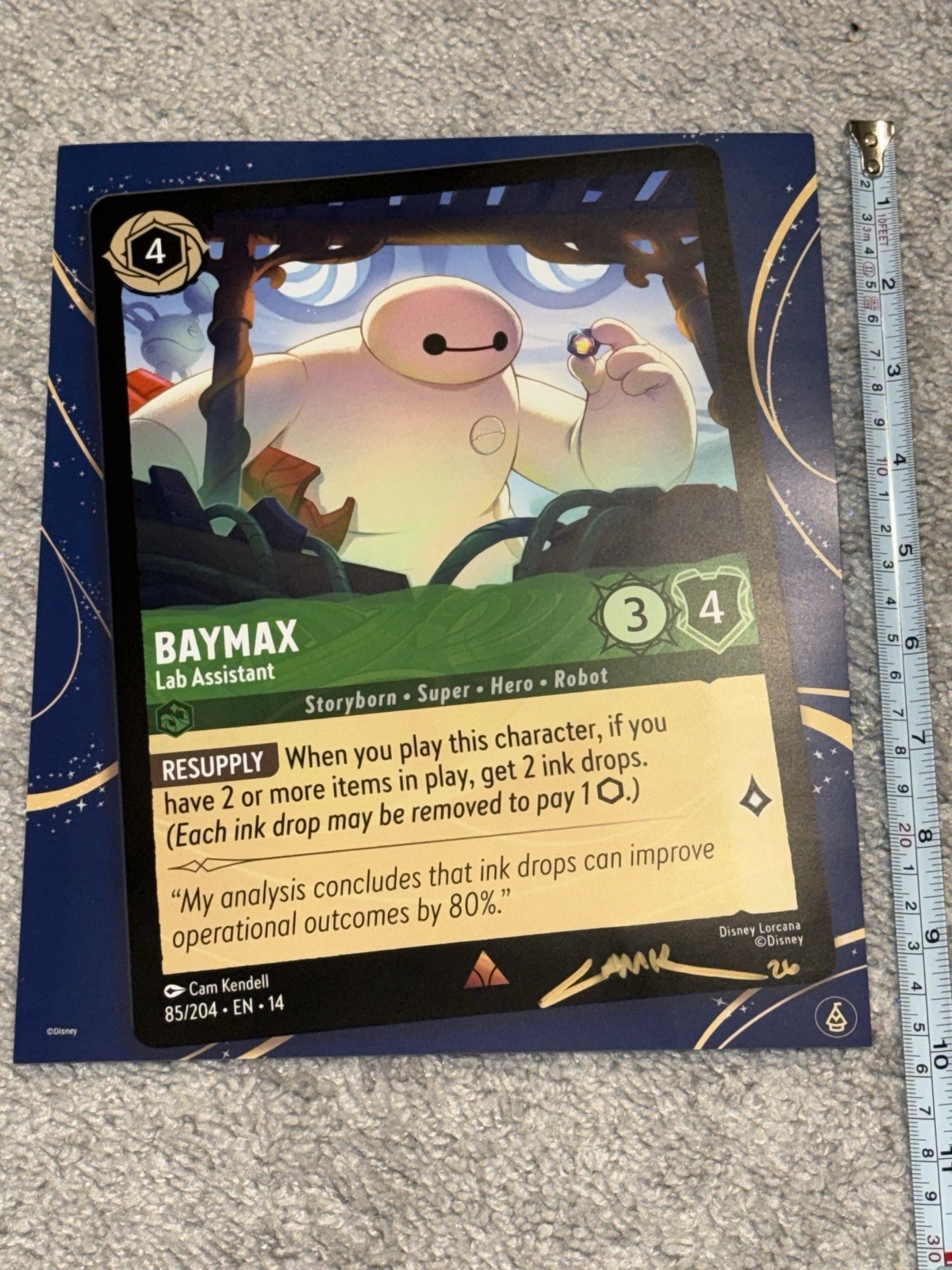 Disney Lorcana Baymax Lab Assistant HAND SIGNED 8x10 promo by artist Cam Kendell Disney Lorcana Baymax Lab Assistant HAND SIGNED 8x10 promo by artist Cam Kendell