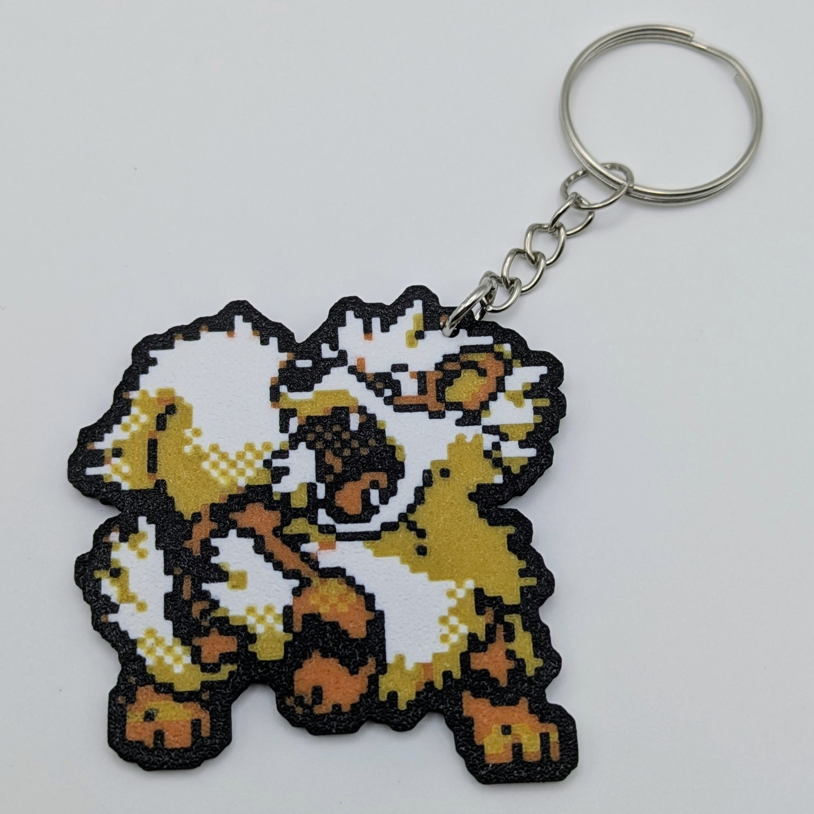 Arcanine- Pokémon Keychain – Retro Silver Sprite Pixel Art Bag Charm