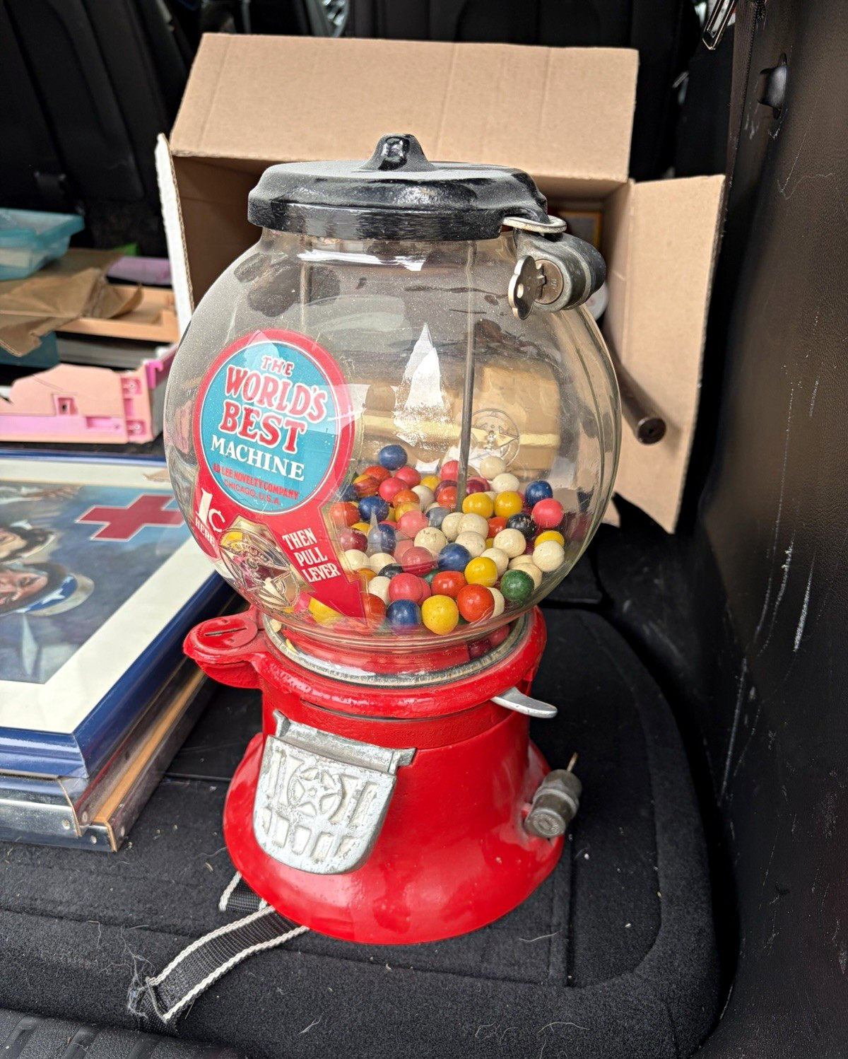 Vintage Columbus Model M coin-operated gumball and peanut vending machine.