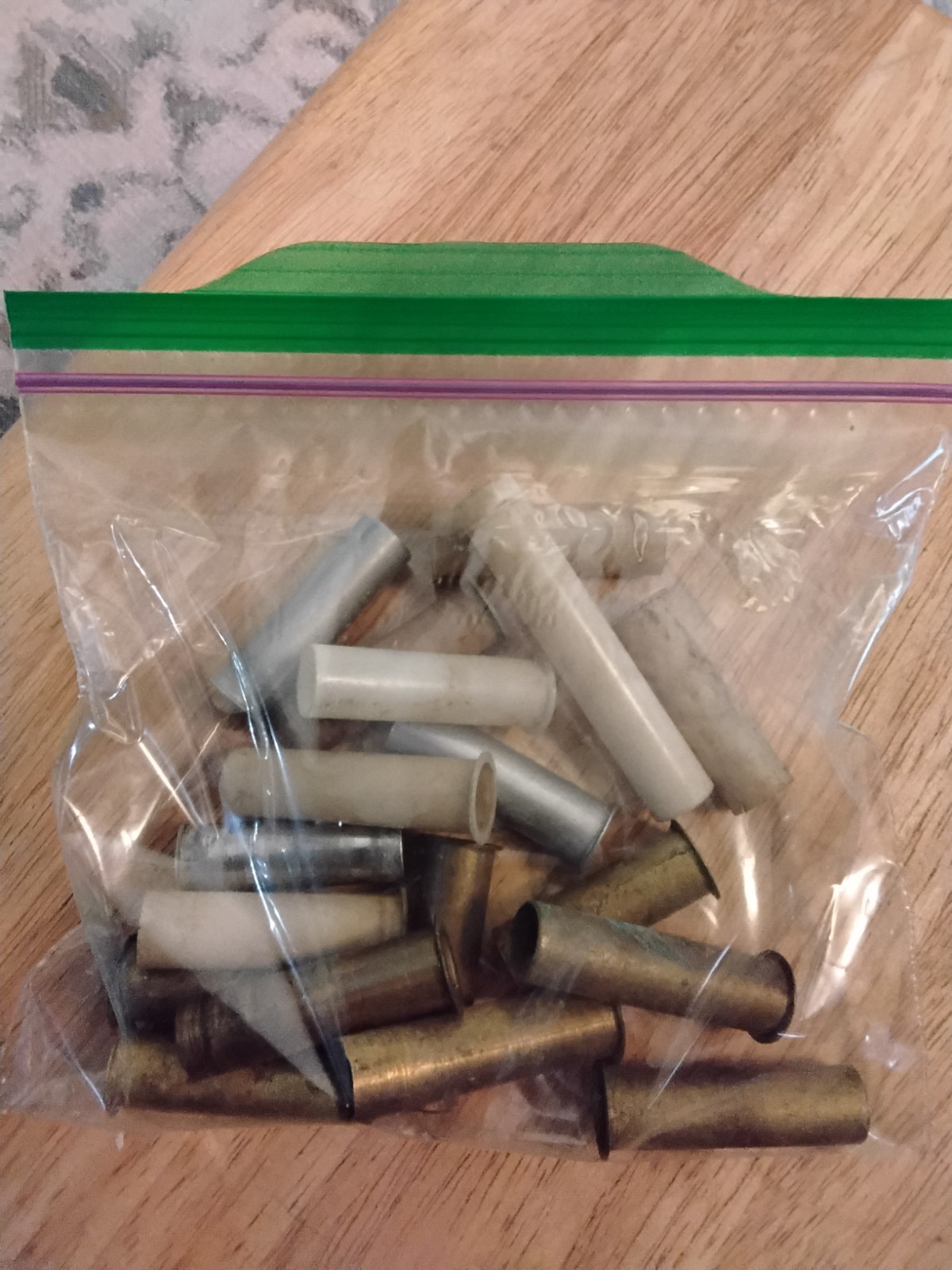 BAG OF PINBALL COIL SLEEVES- BRASS & OTHERS
