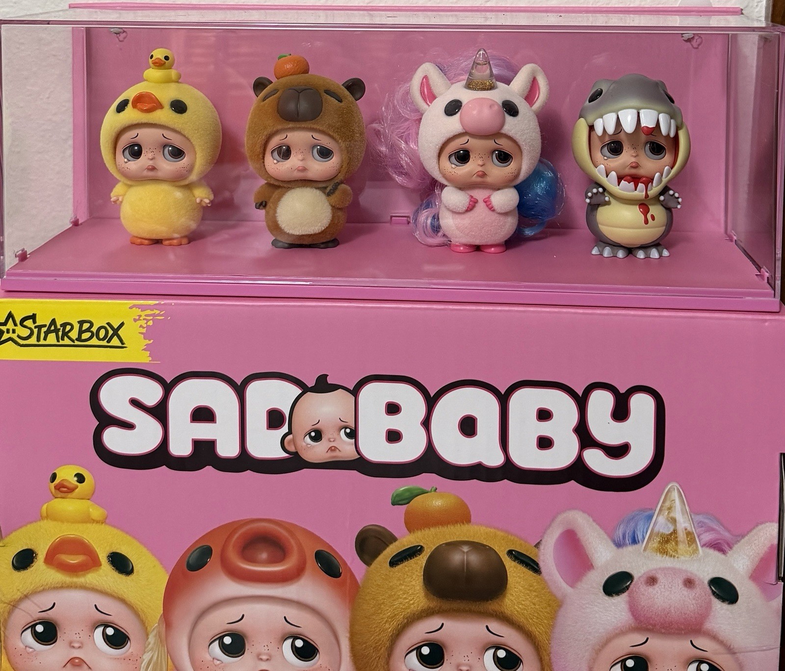 New Zuru StarBox SadBaby Figure Set of 4 w/ Display Case.