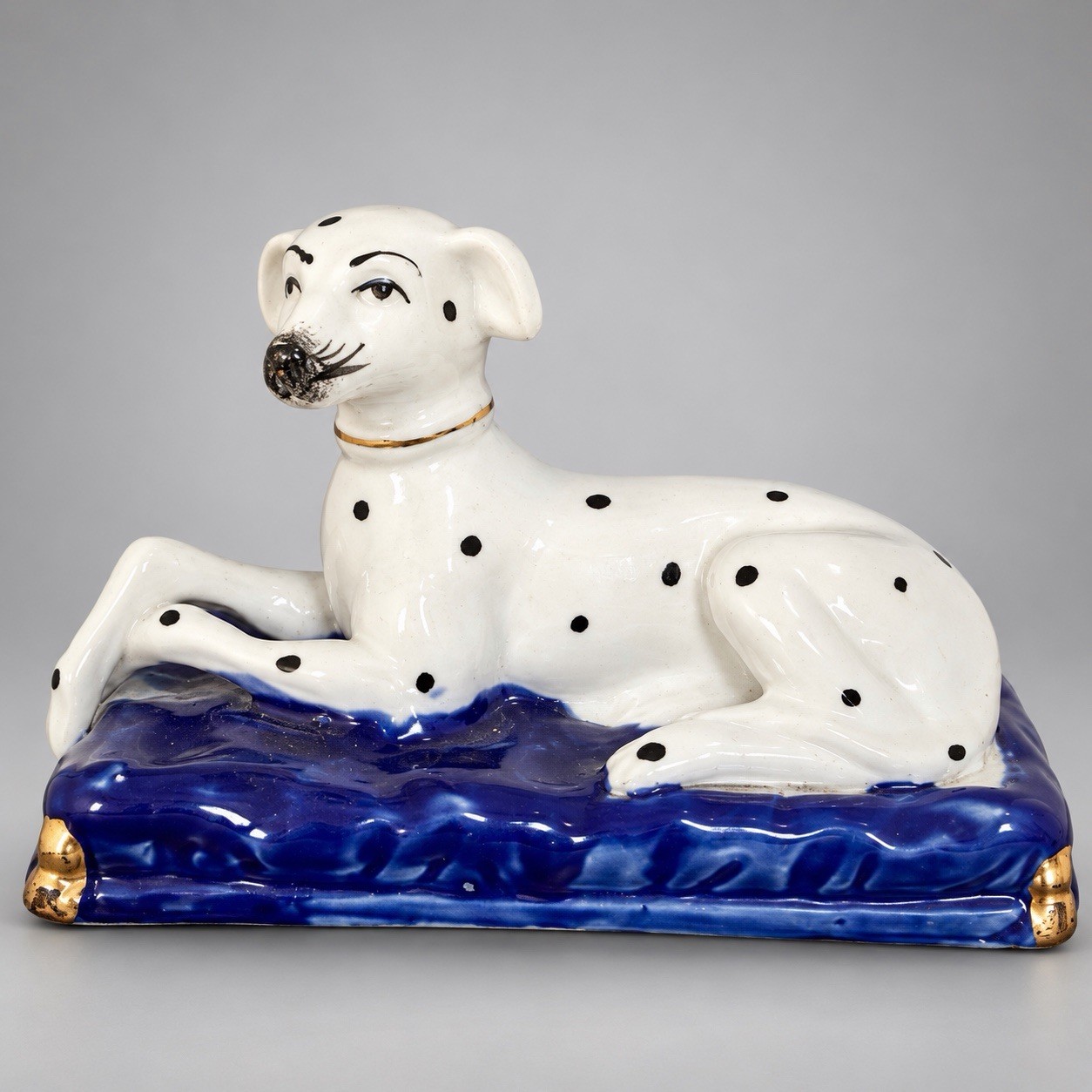 Staffordshire Style Dalmatian Dog Figurine Reclining Cobalt Blue Base Gold Trim