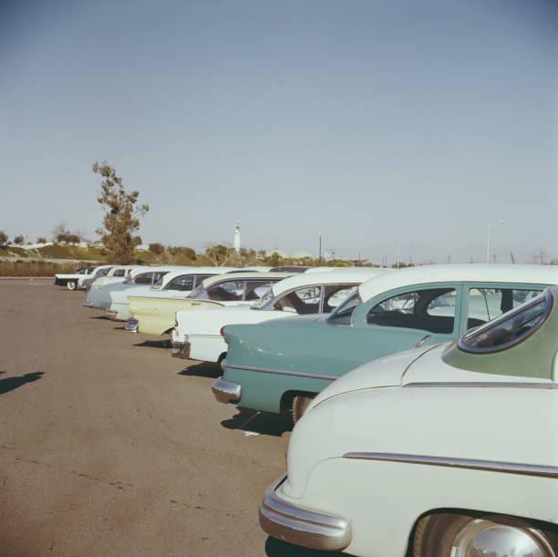Cars in the car park of Disneyland\'s Tomorrowland theme park, w - 1960 Old Photo
