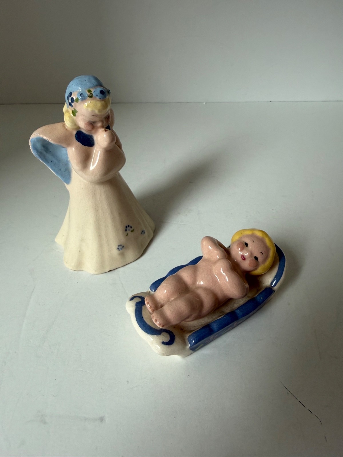 Kay Finch Praying Angel and Baby in Cradle ceramic figurines-Sold as a Pr.