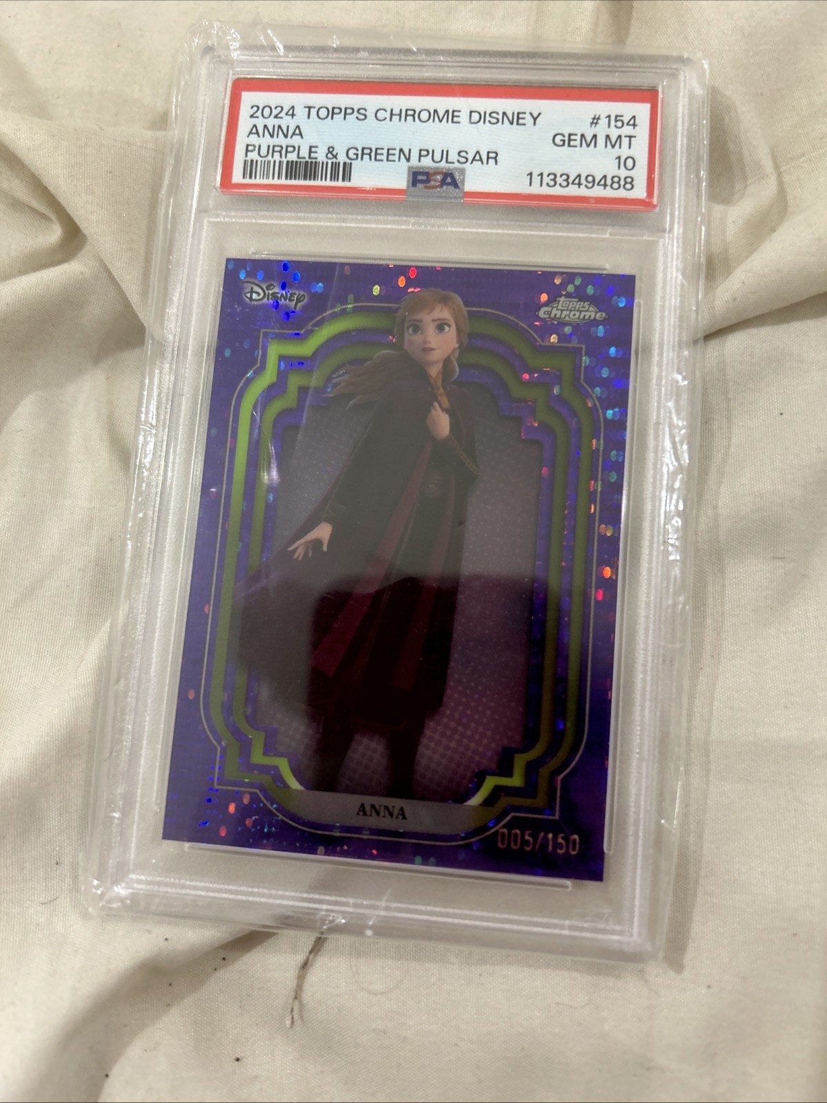 Anna - 2024 Topps Chrome Disney #154 Purple & Green Pulsar Refractor /150. PSA10 Anna - 2024 Topps Chrome Disney #154 Purple & Green Pulsar Refractor /150. PSA10