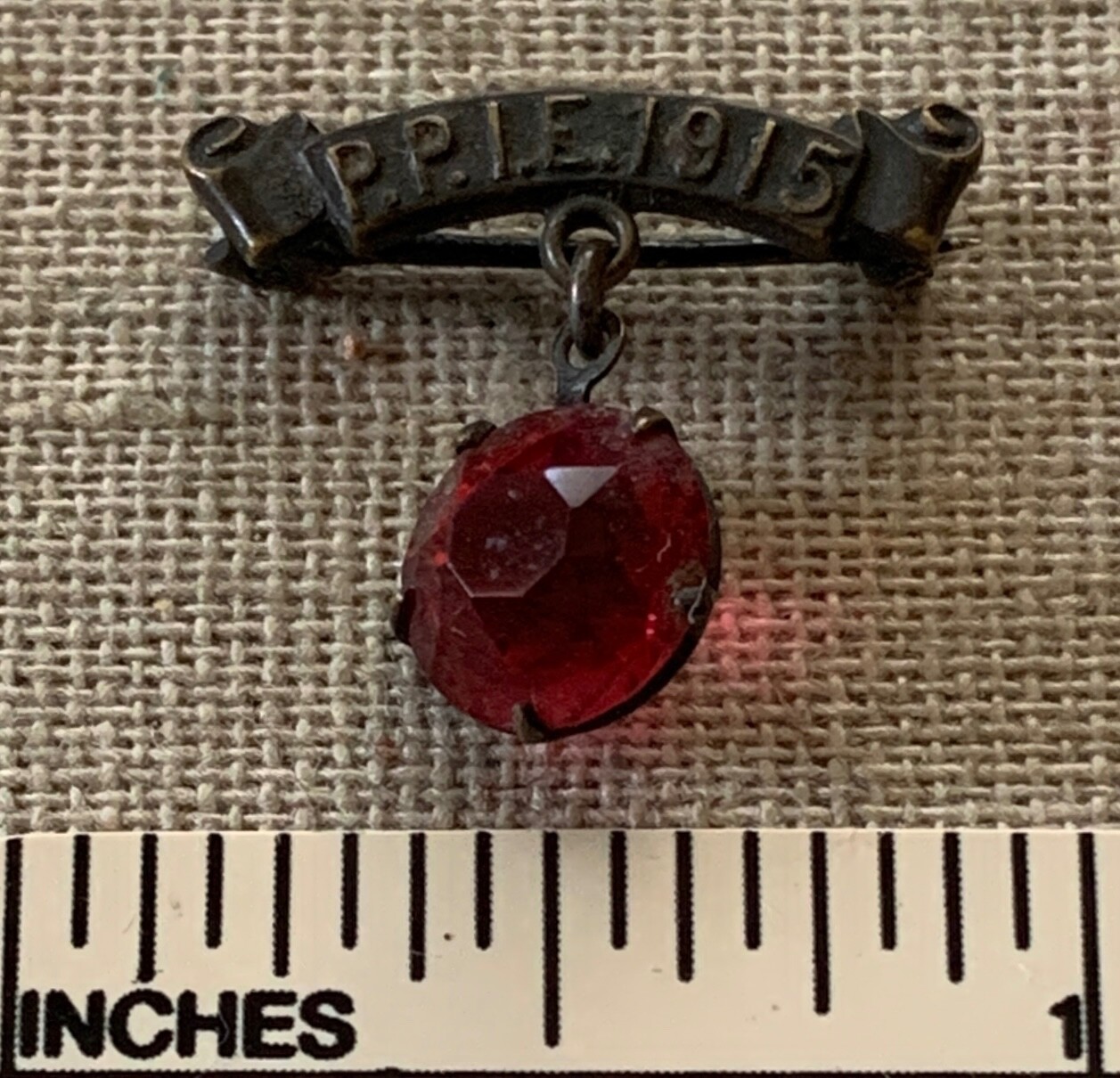 1915 PPIE PAN PACIFIC INTERNATIONAL EXPO Novagem Official PIN Antique Ruby ?
