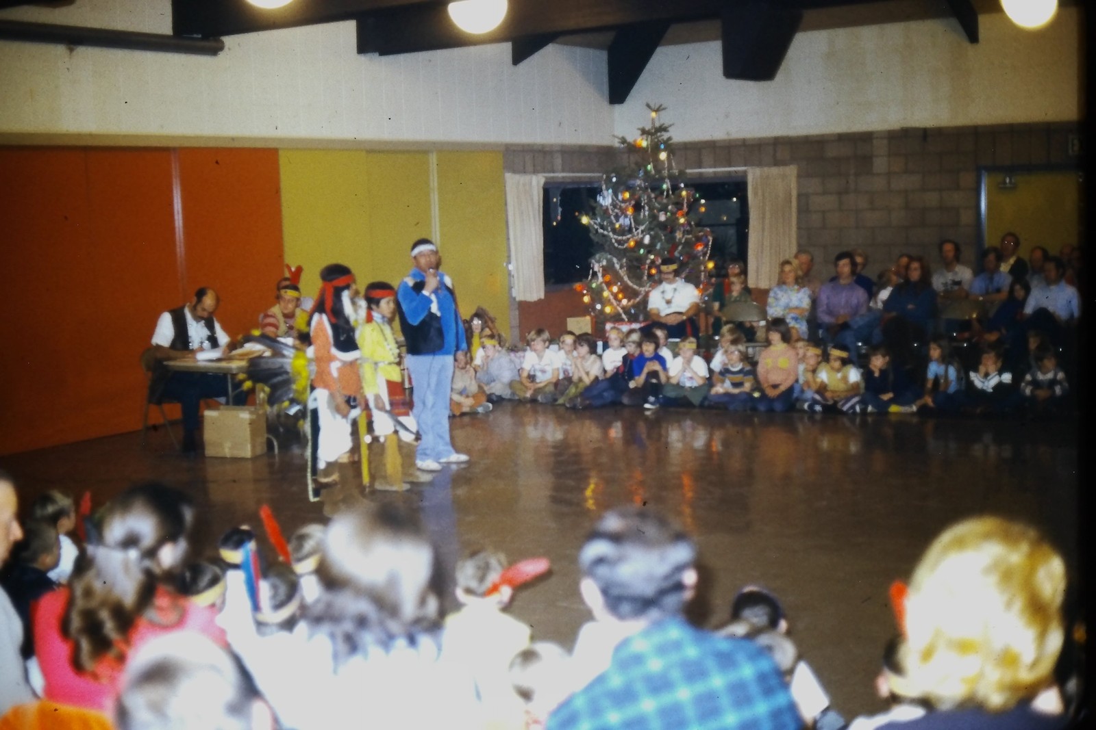 c1970's Kodachrome 35mm Slide, Native Dancers Christmas Audience American orange