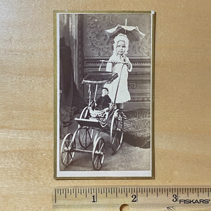 1870s CDV Photo of Child Posing with her Favorite Toy Parasol Doll and Carriage
