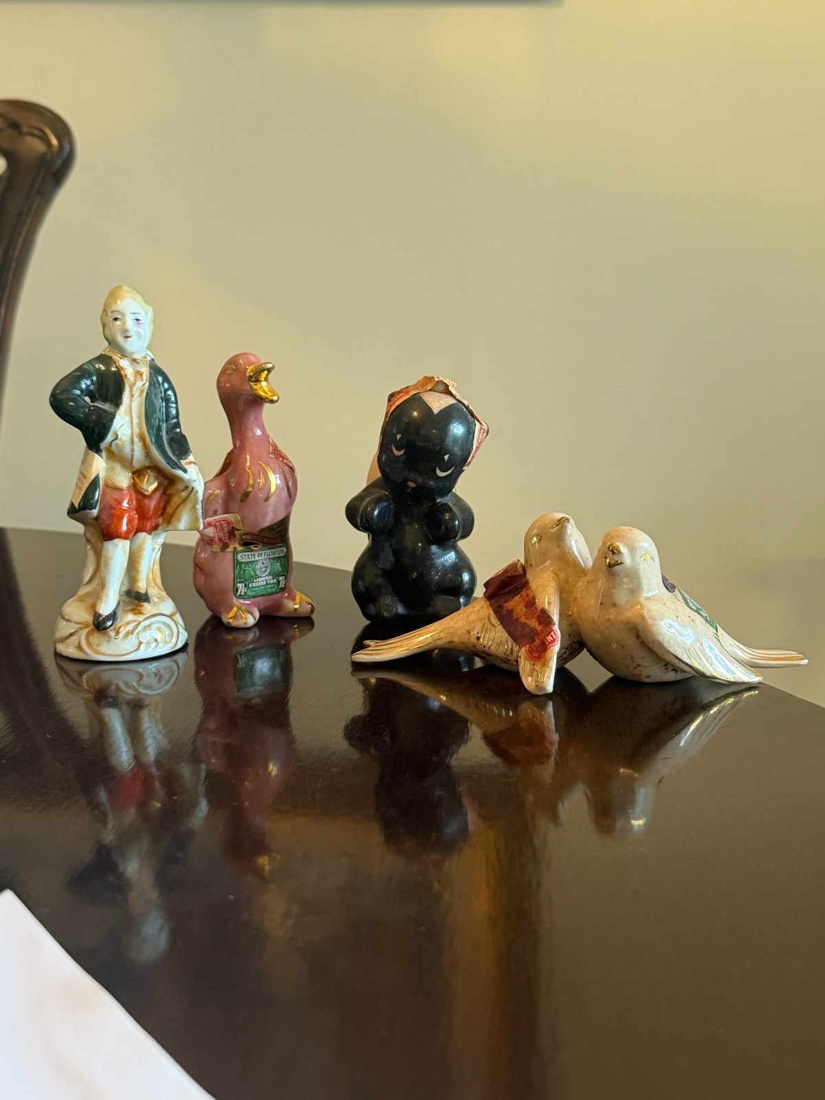 4 Vintage Ceramic Mini Liquor Bottles (Empty). Some with Tax Stamps 4 Vintage Ceramic Mini Liquor Bottles (Empty). Some with Tax Stamps
