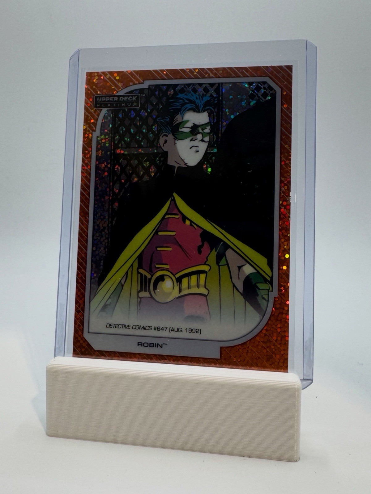 01/33  2026 UD PLATINUM DC ORANGE SPARKLE /33 ROBIN
